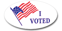 Photo of an oval 'I Voted' sticker with an American Flag waving